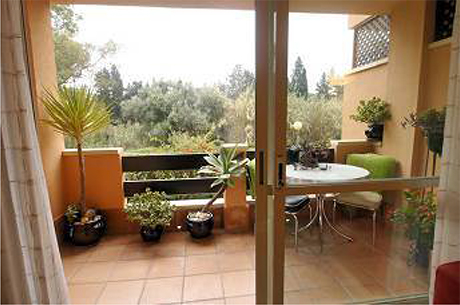 view to terrace from inside cabopino apartment